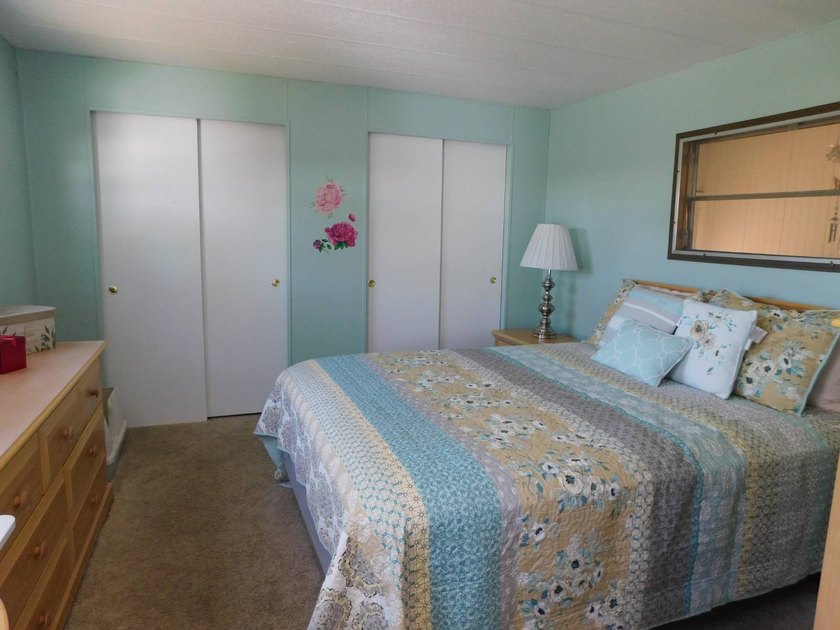 This beautifully remodeled home features a stylish galley-style - photo 11