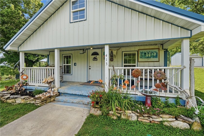 Positioned on 5.14 acres in a scenic Ozark Mountain setting near - photo 18