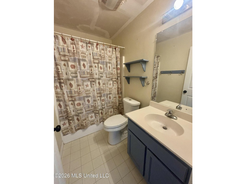 This charming 3 Bedroom/2 Bathroom Cottage-style home is nestled - photo 8