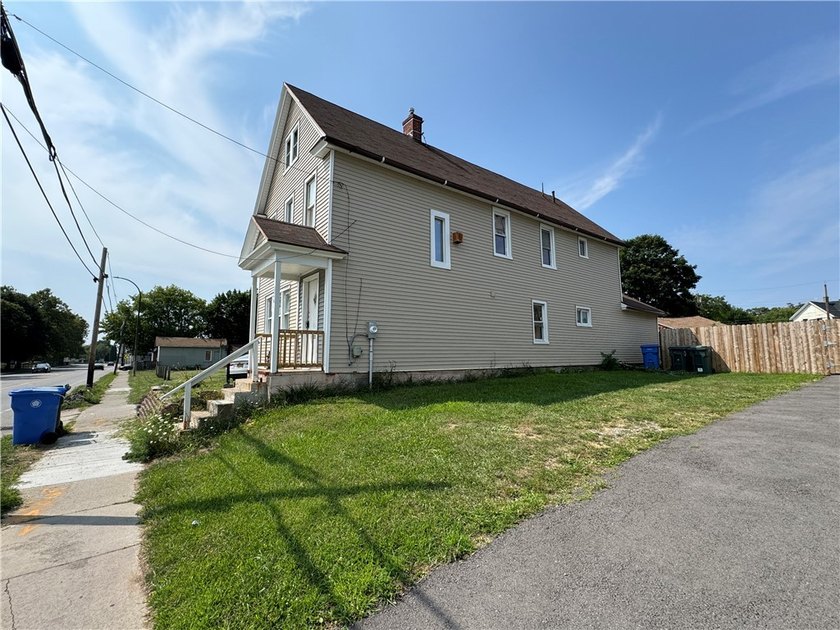 Welcome to 604 Upper Falls Blvd! This home offers two completely - photo 2
