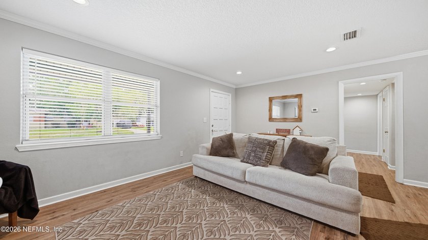 Welcome to this beautifully renovated 4-bedroom, 3-bathroom - photo 2
