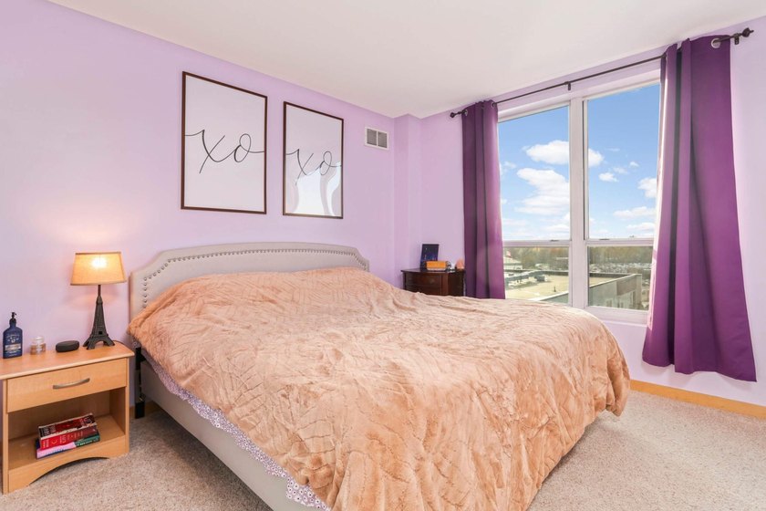 Welcome to unit #702! This top-floor unit offers an open concept - photo 15