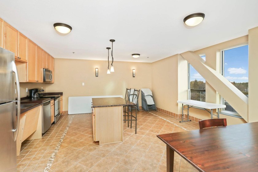 Welcome to unit #702! This top-floor unit offers an open concept - photo 24