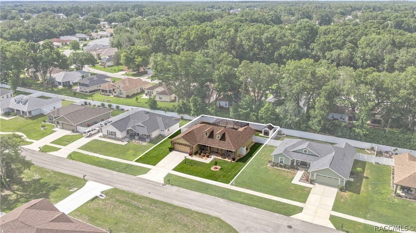 THIS HOME HAS IT ALL! Beautiful custom-built pool home in - photo 2