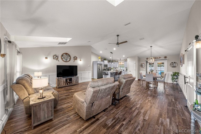 THIS HOME HAS IT ALL! Beautiful custom-built pool home in - photo 3