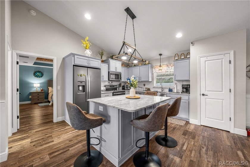 THIS HOME HAS IT ALL! Beautiful custom-built pool home in - photo 7