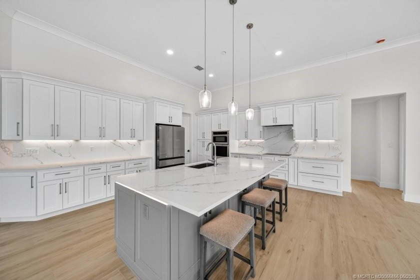 THE MOST COMPREHENSIVELY RENOVATED HOME IN PALM CITY - photo 3