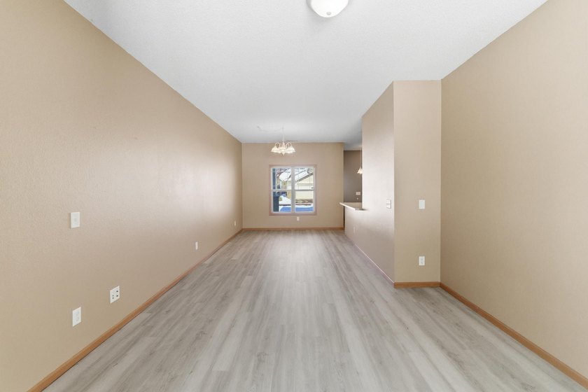 This well-maintained one-level townhome offers approximately 1 - photo 5