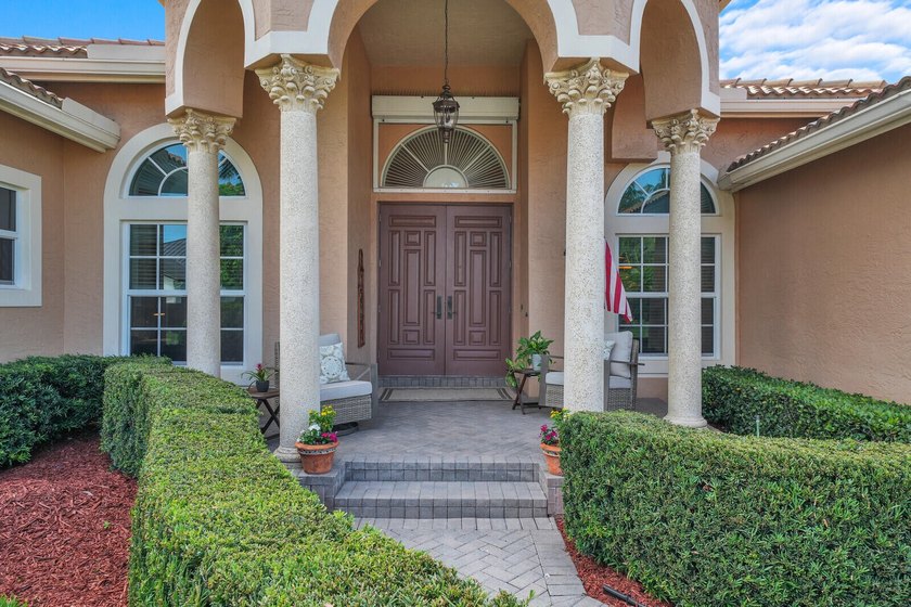 Lovingly maintained this custom built residence offers timeless - photo 3