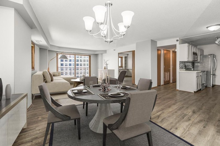 Soaring above the city on the 23rd floor, this refined 2-bedroom - photo 2