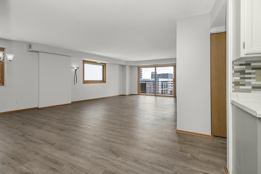Soaring above the city on the 23rd floor, this refined 2-bedroom - photo 4