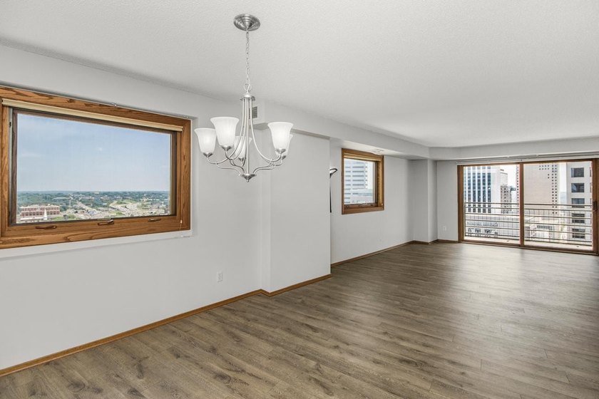 Soaring above the city on the 23rd floor, this refined 2-bedroom - photo 6