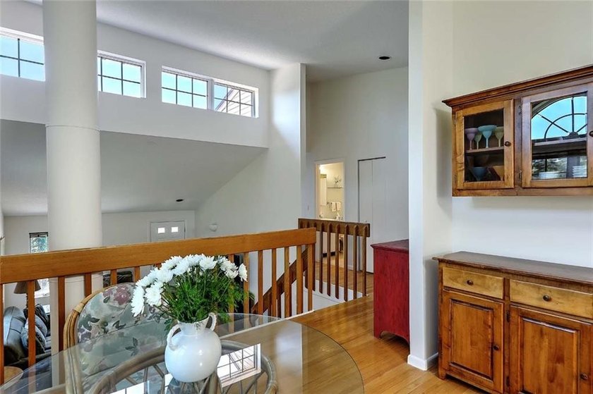 This well-maintained townhouse-style condominium is located in - photo 12