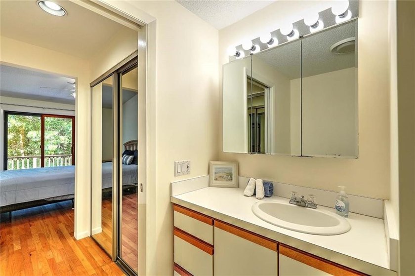This well-maintained townhouse-style condominium is located in - photo 19