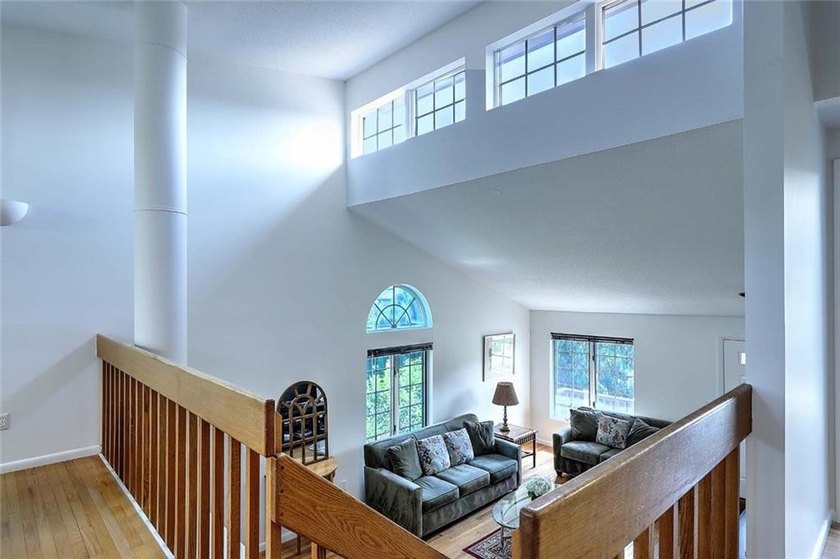 This well-maintained townhouse-style condominium is located in - photo 26