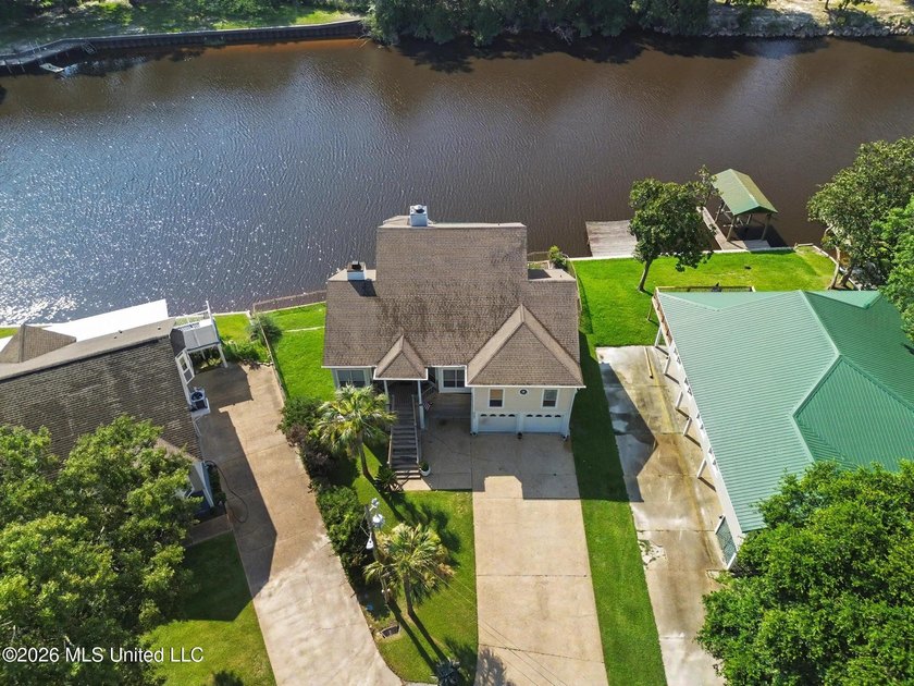 Welcome to **3487 Wells Ferry Cove**, an exceptional waterfront - photo 2