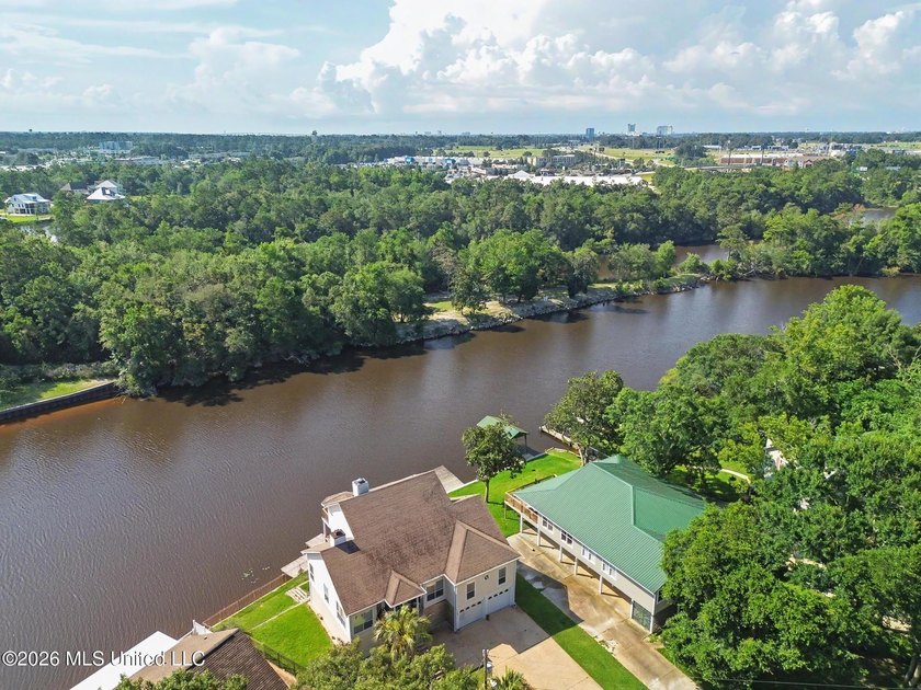 Welcome to **3487 Wells Ferry Cove**, an exceptional waterfront - photo 3