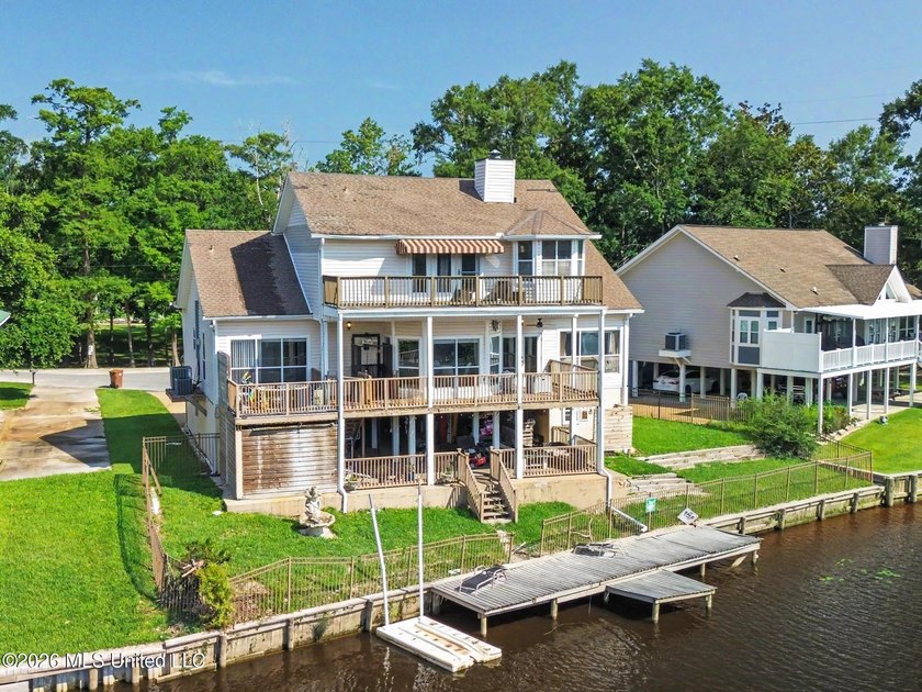 Welcome to **3487 Wells Ferry Cove**, an exceptional waterfront - photo 4