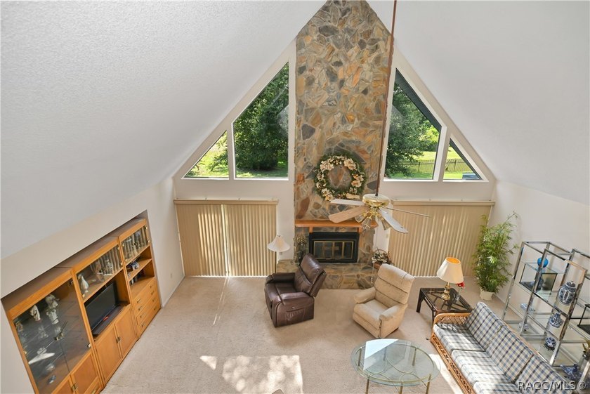 A MUST see... A rare find! This spacious charming 1986-built one - photo 9