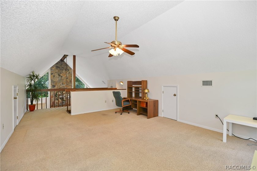 A MUST see... A rare find! This spacious charming 1986-built one - photo 10