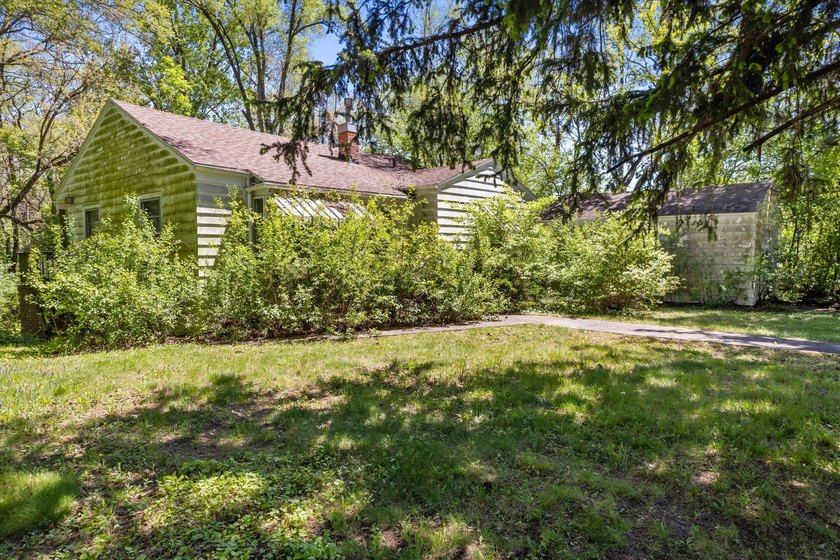 Nestled among the trees in beautiful Burlington, this charming - photo 22