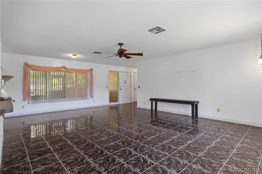 Nestled on approximately 1.6 acres in Homosassa, this charming - photo 5
