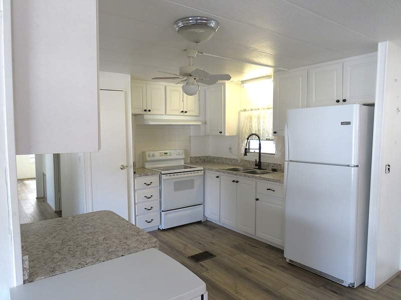 This charming 1248 square feet manufactured home was built in - photo 3
