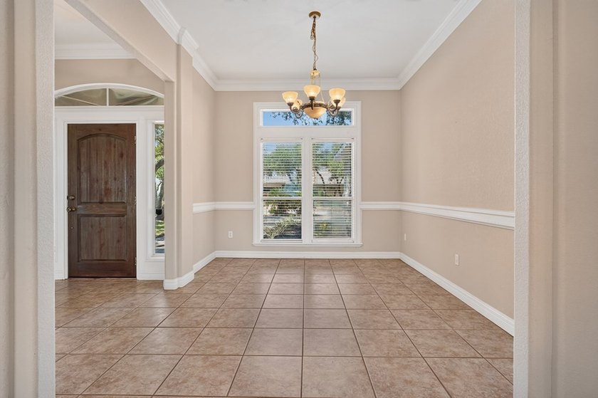 Nestled beneath a canopy of majestic oak trees and overlooking - photo 36