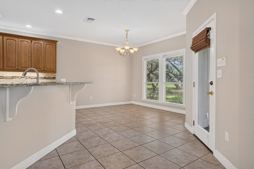 Nestled beneath a canopy of majestic oak trees and overlooking - photo 41