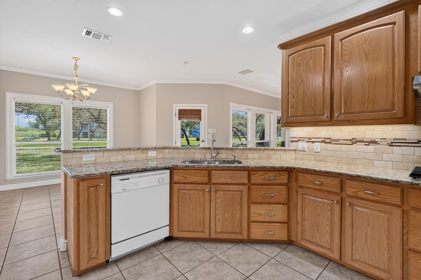 Nestled beneath a canopy of majestic oak trees and overlooking - photo 45
