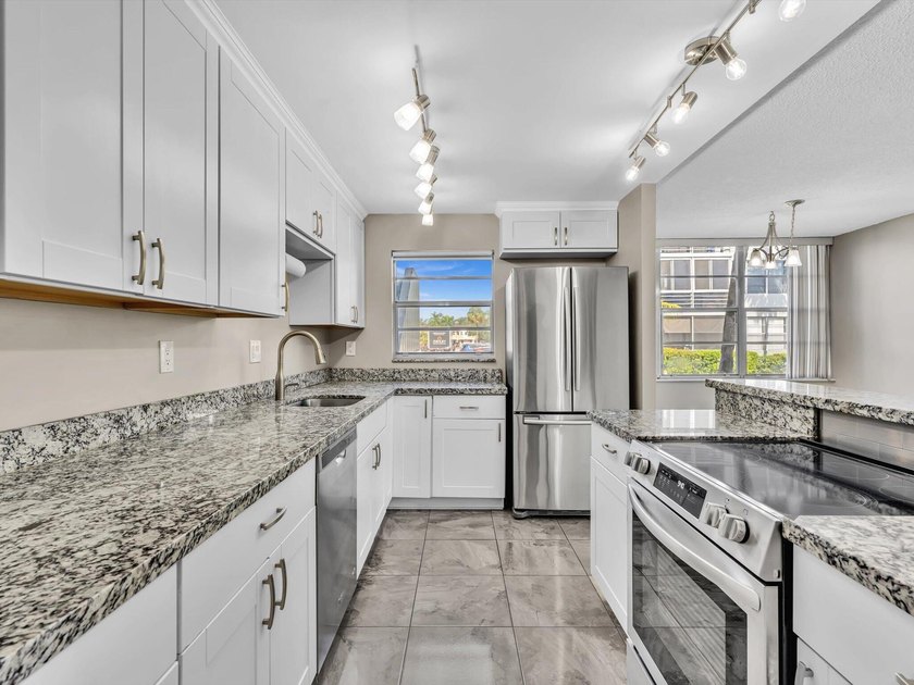 Welcome to Watergate Condominium No. 4 in Hollywood, FL, where - photo 5