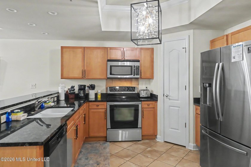 Experience luxury coastal living in this beautifully updated - photo 3