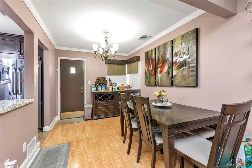 Welcome to this three-bedroom, two-bath split-level home - photo 4