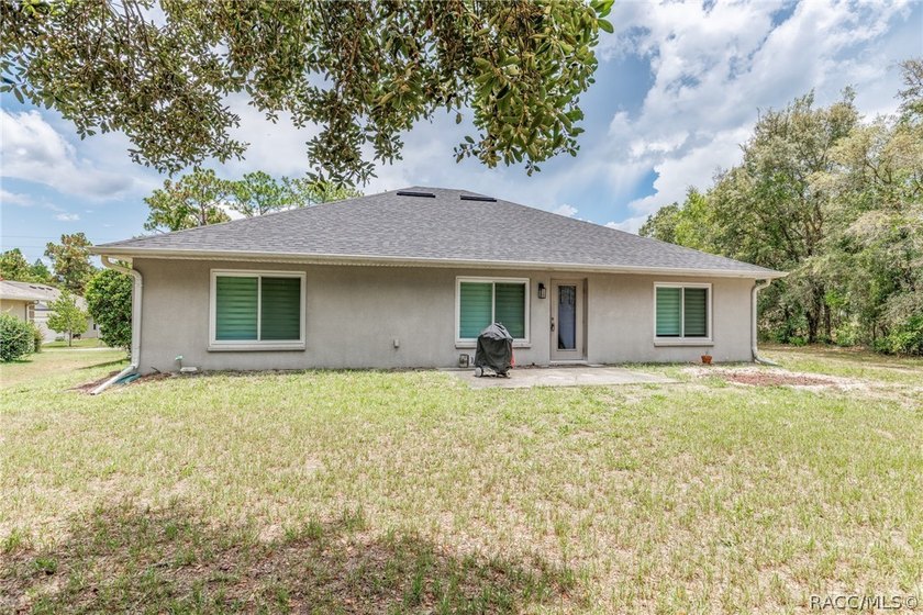 WOW HURRY AND GET THIS 4/2/2 CAR GARAGE HOME SUGARMILL WOODS!! - photo 3