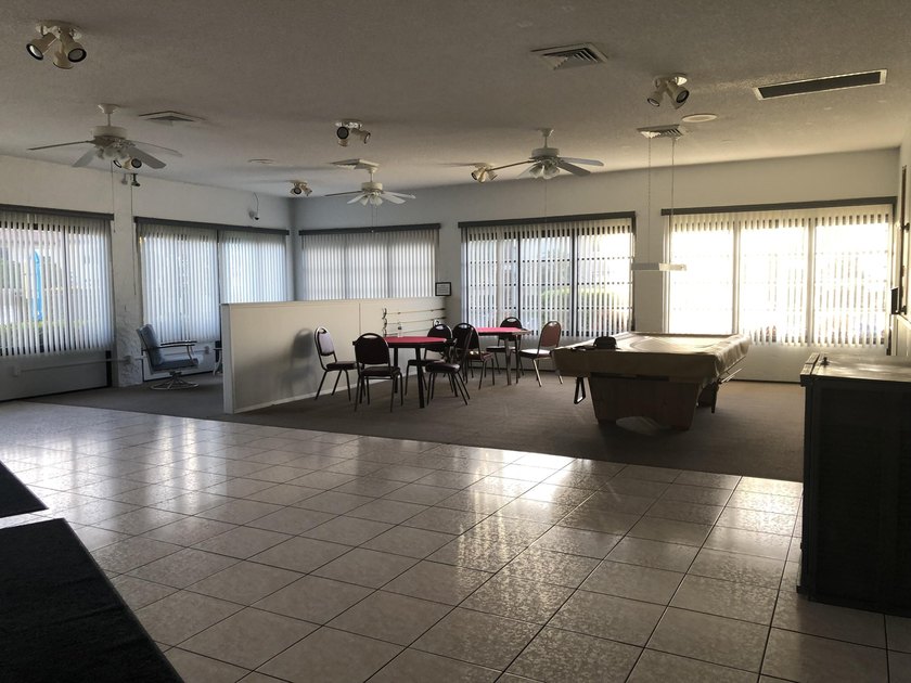 LOCATION IS THE KEY! NESTLED IN A VIBRANT 55+ COMMUNITY, THIS - photo 25