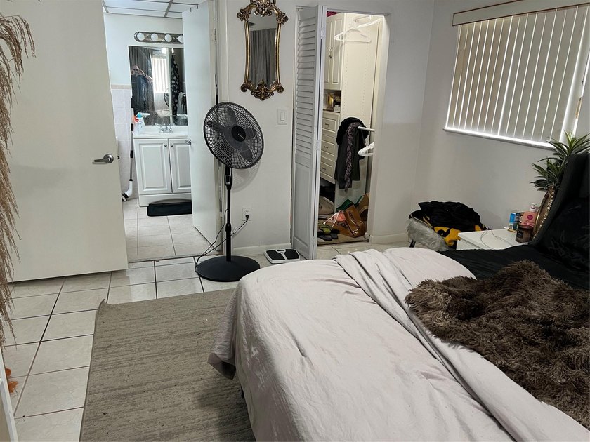 THIS COMFORTABLE 2 BEDROOM 2 BATHROOM HOME HAS A TASTEFULLY - photo 6