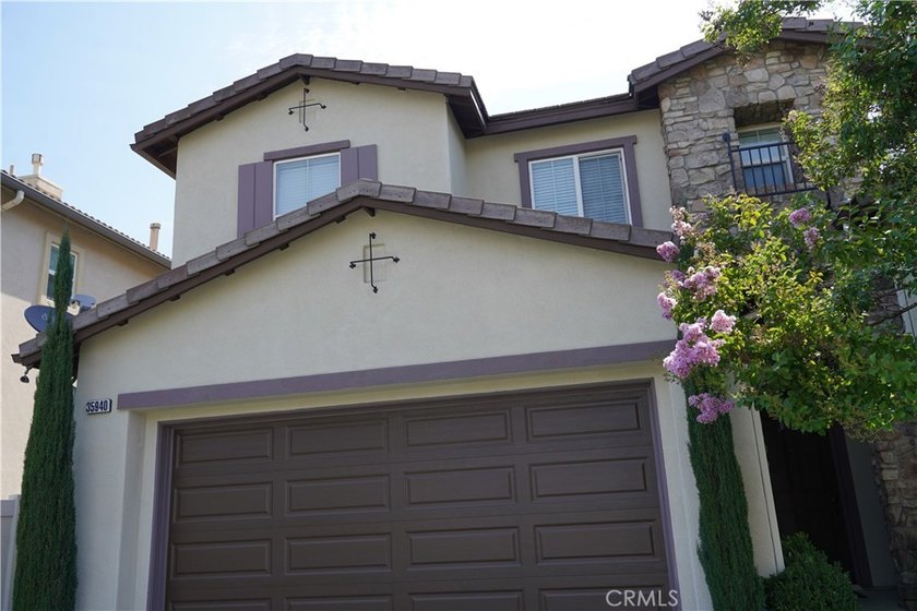 Welcome to 35940 Trevino Trail, where comfort, space, and - photo 2
