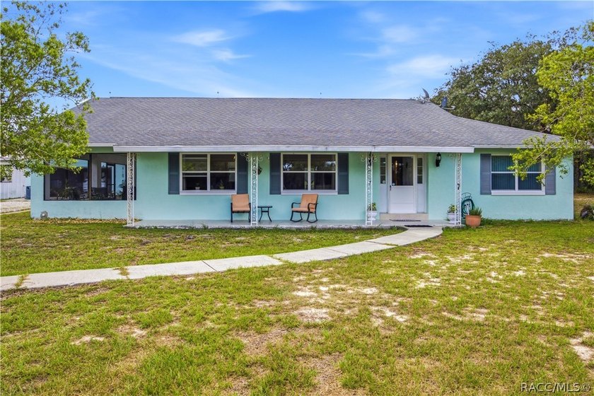 Welcome to this unique country-style property located in - photo 3