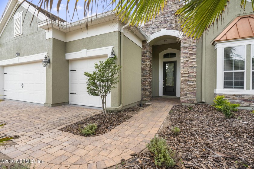 Welcome to this beautifully updated coastal retreat in the - photo 3