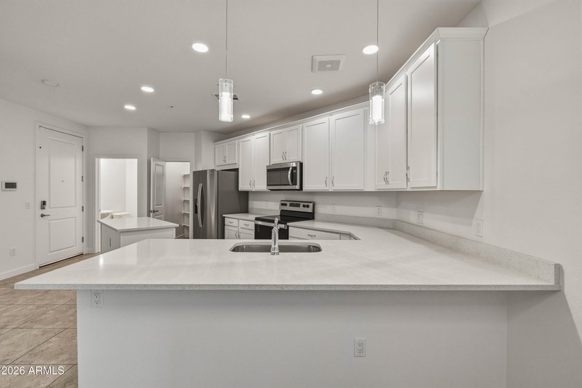 Welcome to The Cays at Downtown Ocotillo, where luxury meets - photo 6