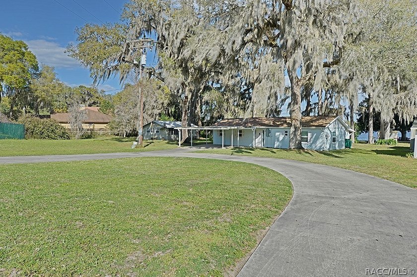 This charming waterfront property offers a serene water views - photo 3