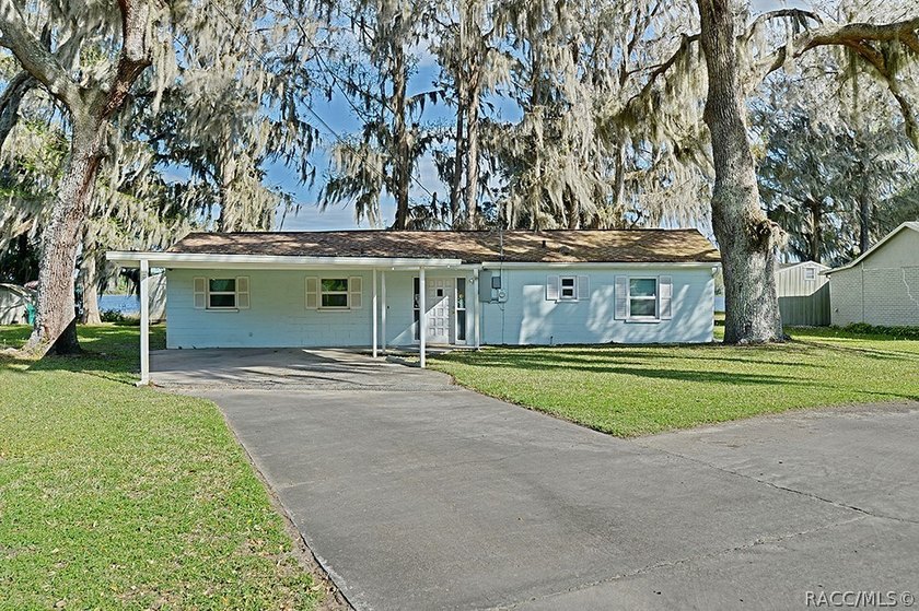 This charming waterfront property offers a serene water views - photo 4