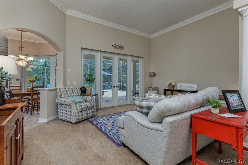EXQUISTIE FLORIDA LIVING ABOUNDS IN THIS INVITING 3/2/2 WITH DEN - photo 11