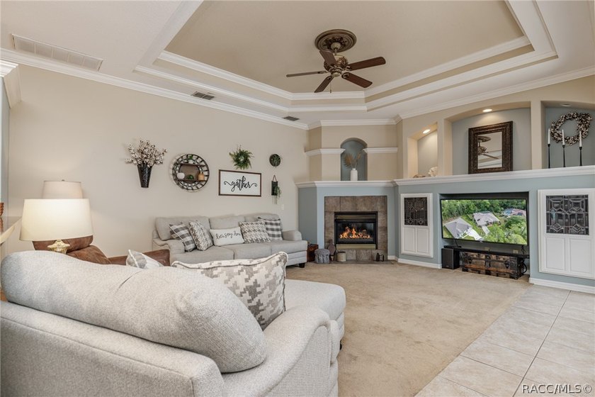 EXQUISTIE FLORIDA LIVING ABOUNDS IN THIS INVITING 3/2/2 WITH DEN - photo 13
