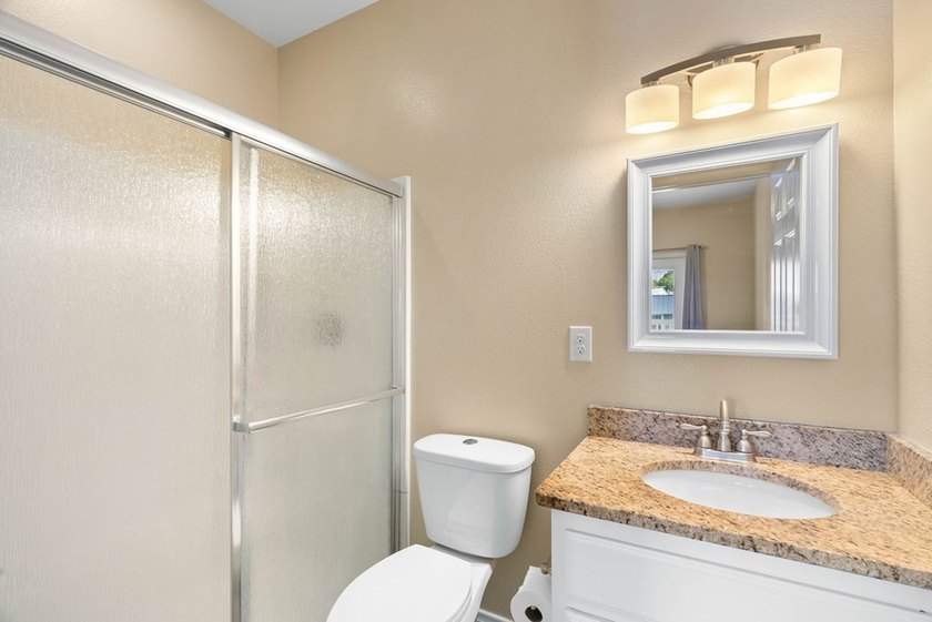 Situated on two spacious lots, this charming 3-bedroom, 2-bath - photo 16