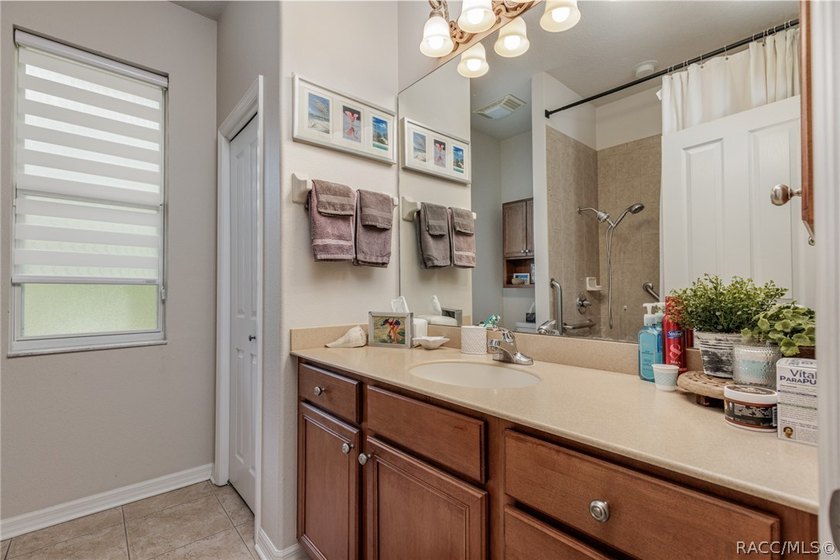 EXQUISTIE FLORIDA LIVING ABOUNDS IN THIS INVITING 3/2/2 WITH DEN - photo 31