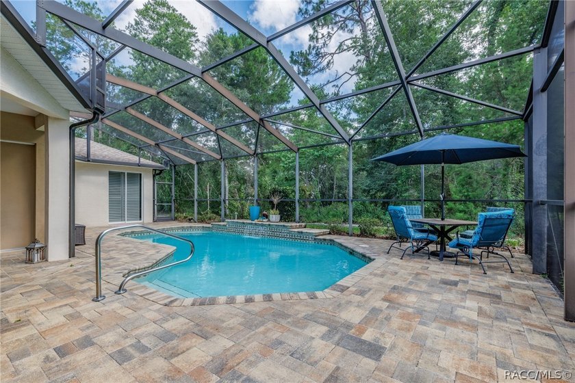 EXQUISTIE FLORIDA LIVING ABOUNDS IN THIS INVITING 3/2/2 WITH DEN - photo 39