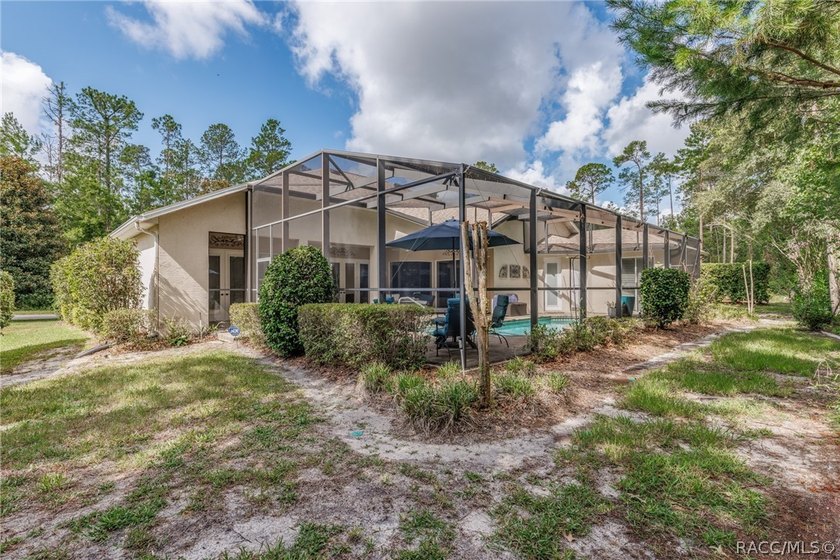 EXQUISTIE FLORIDA LIVING ABOUNDS IN THIS INVITING 3/2/2 WITH DEN - photo 46