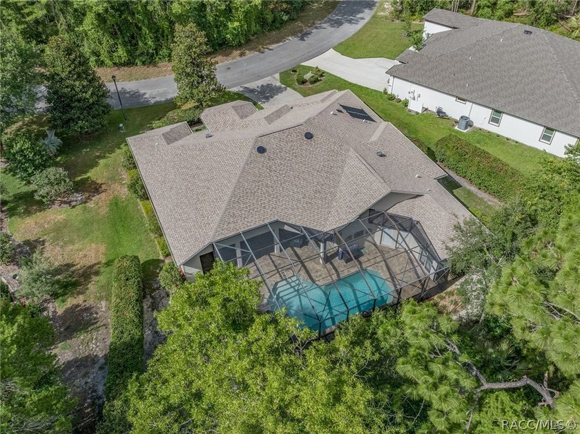 EXQUISTIE FLORIDA LIVING ABOUNDS IN THIS INVITING 3/2/2 WITH DEN - photo 50