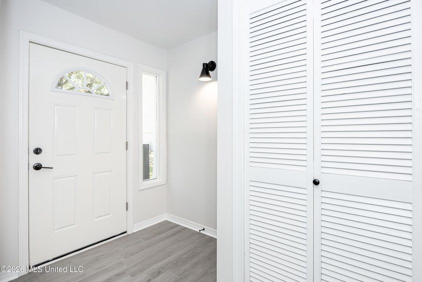 Stunning newly renovated white brick home in DOWNTOWN GOLF CART - photo 6